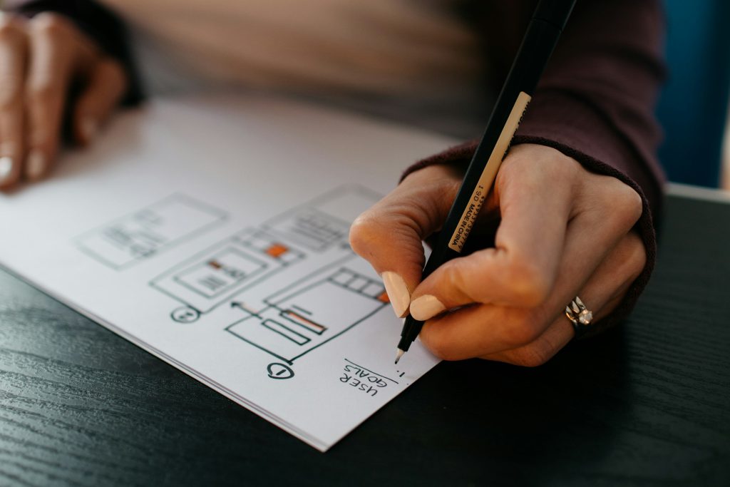 Sketching website wireframes on paper
